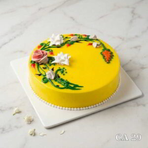 Round yellow cake decorated with flowers CA29